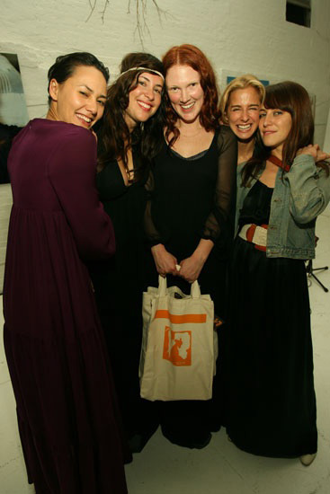 In the picture: (from left to right) Pam Racine
(photographed in the exhibit as well as in the band Go Go Bordello and
girlfriend to actor Elijah Wood), Simone Rubi (singer and artist), Liz
McClean (designer), and Feist (Grammy nominated singer)